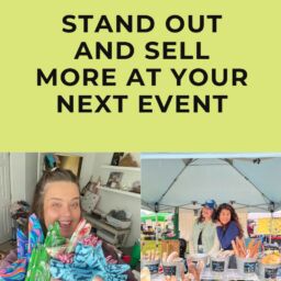 A vibrant vendor table at a local market, showcasing a neatly arranged display of products, branded signage, and engaging visuals, attracting customers at a bustling event in Hampton Roads, VA.